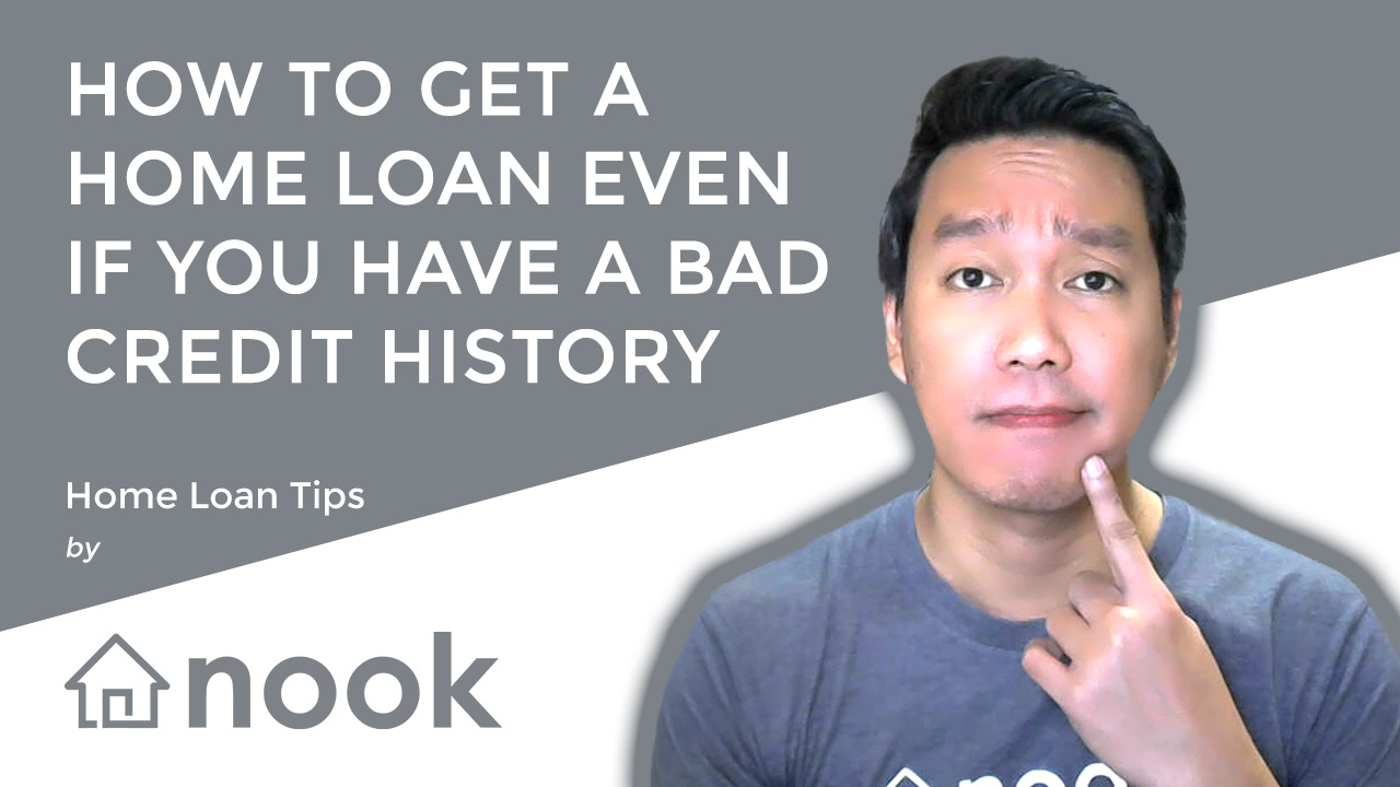 A Filipino couple reviewing their home loan options together, hopeful despite a past credit setback