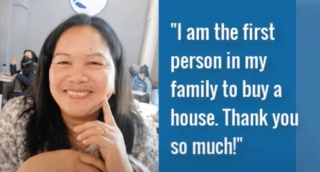 A Filipino family in front of the home they bought back in the Philippines while working overseas
