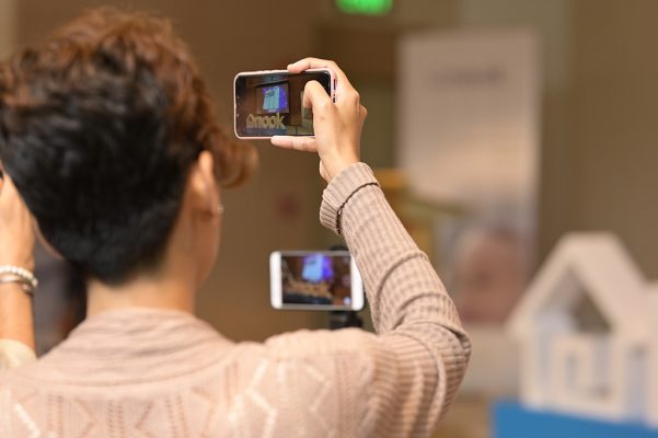 Woman Taking Photos Of Nook